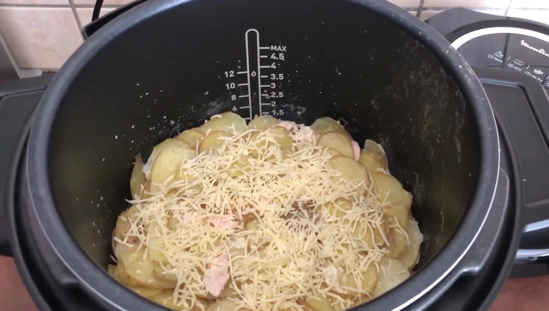 Chicken and potato gratin in a pressure cooker.