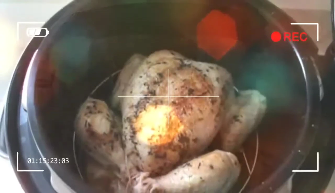 Chicken cooking in a pressure cooker