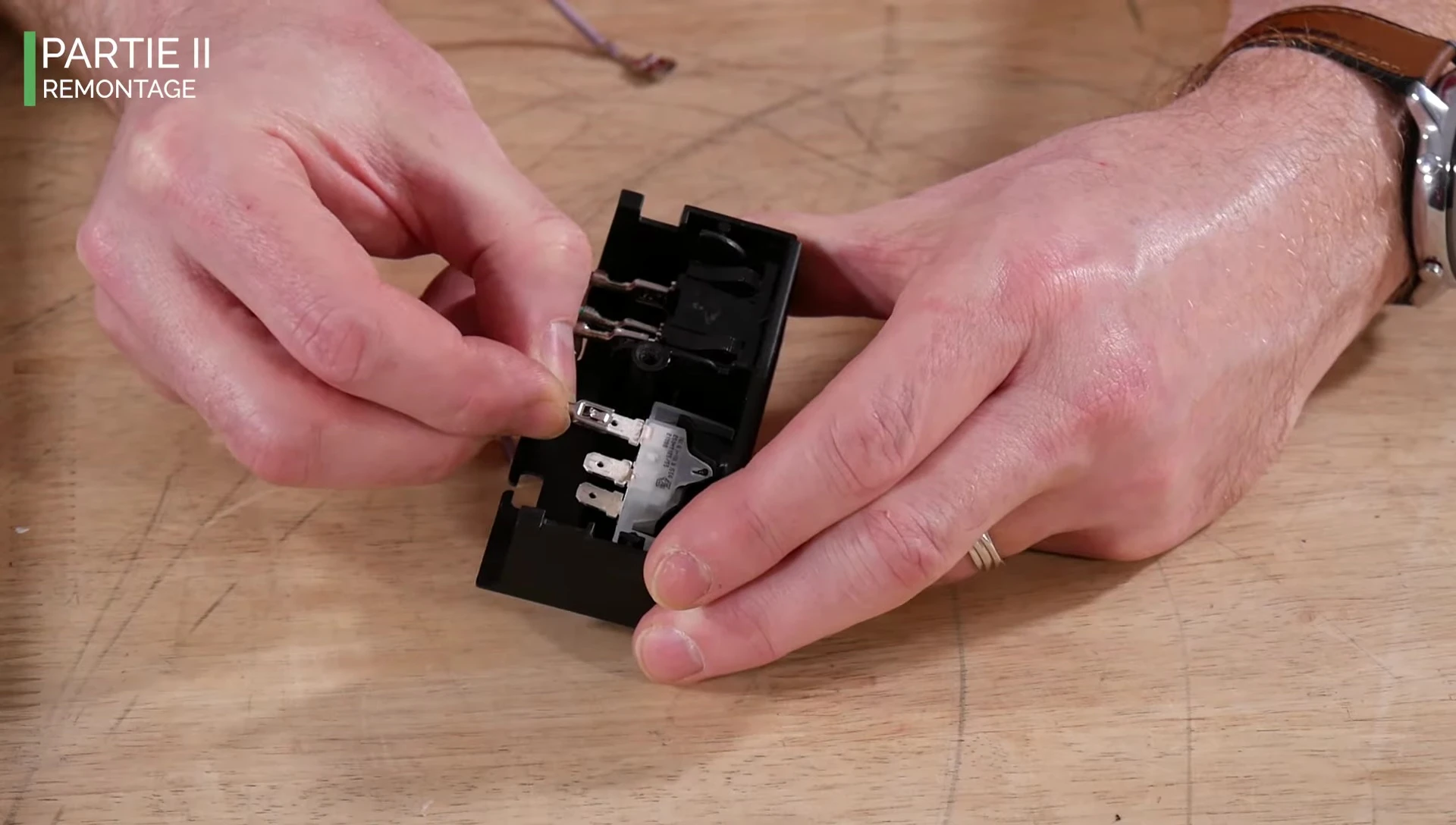 Reassembling switch into housing