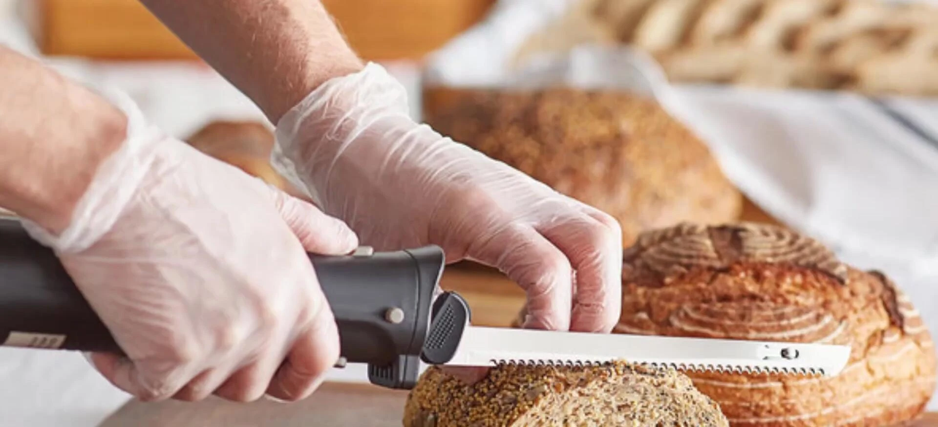 Electric knife carving roasted turkey