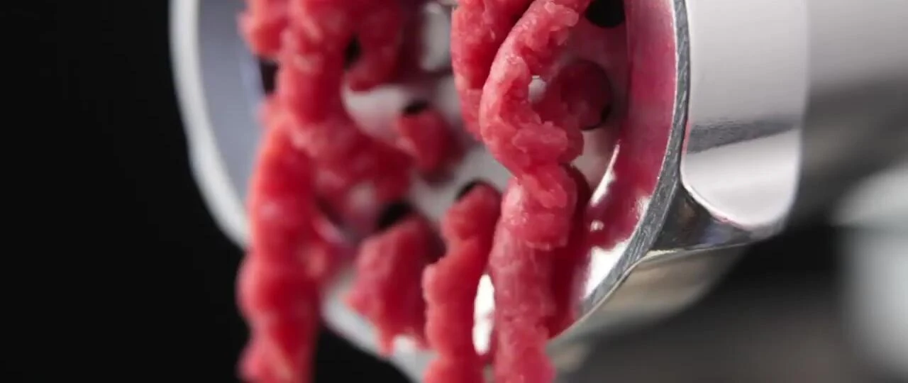 Meat grinder with ground beef